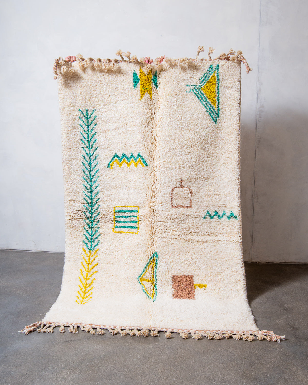 Modern, designer, handcrafted Berber rug from Morocco. Beniourain carpet with beautiful colours and patterns and fluffy wool texture.